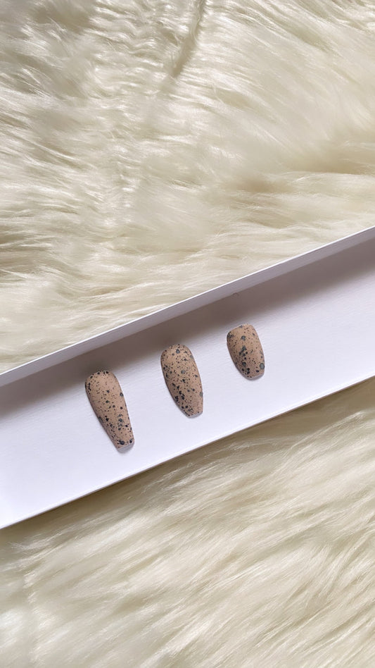 Fall for the Shade '23: Créme de la Créme - Nude & Black Speckles | Cookies & Cream Scent | Matte - Premium Press-On Nails from ShadedbyShanell - Just $25! Shop now at ShadedbyShanell