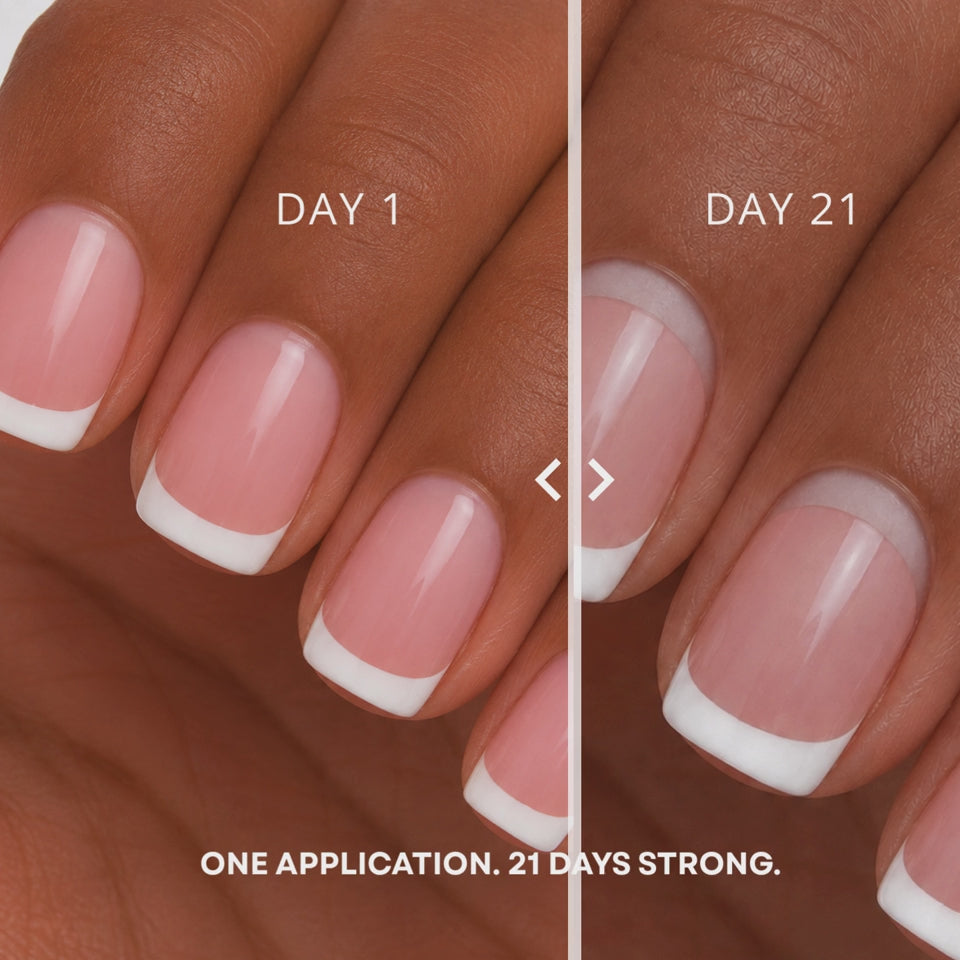 Hand wearing ShadedbyShanell french tip press-ons showing 21 day transition using ShadedbyShanell brush-on nail glue.